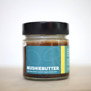 Little Collins Mushroom Butter jar on wooden table