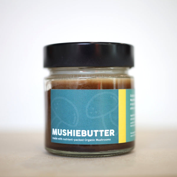 Little Collins Mushroom Butter jar on wooden table