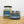 Load image into Gallery viewer, A small and large jar of Little Collins CBD Cannabutter side by side