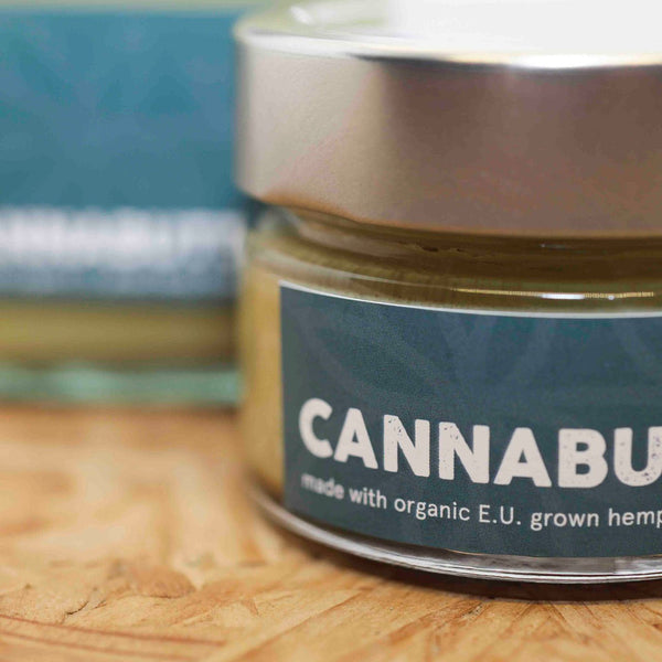 The front of a small jar of CBD Cannabutter