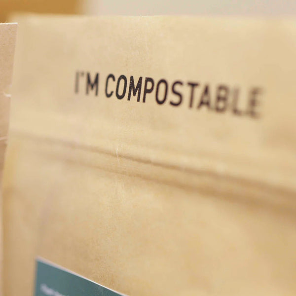 Close-up of compostable packaging seal on Little Collins Hemp Protein Powder eco-friendly bag.