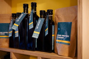 Hemp protein powder and CBD cooking oil displayed as UK-legal CBD edible ingredients