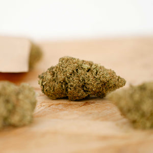 Premium L.A. Chocolate CBD Flower – detailed side view showcasing compact indica buds